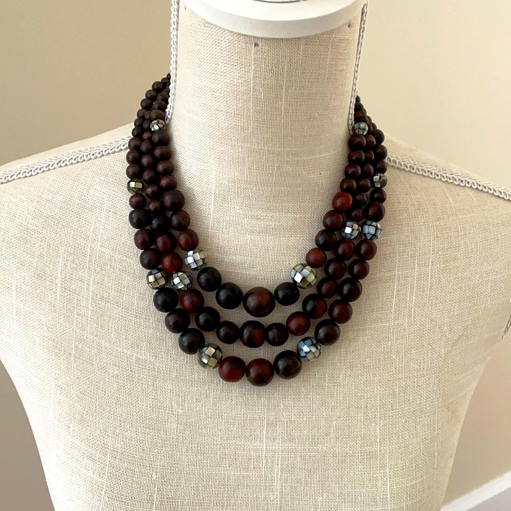 Wood bead necklace. It’s a statement piece!  Looks amazing on!! ♥️